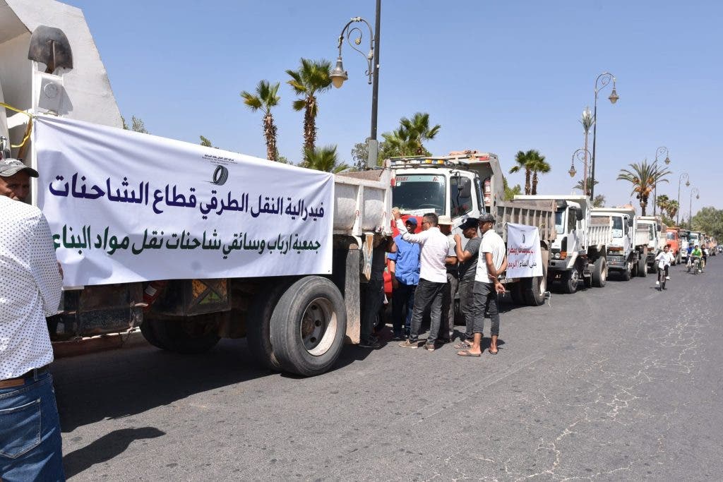 "Sraghna Castle"... sand truck drivers demonstrate in front of workers