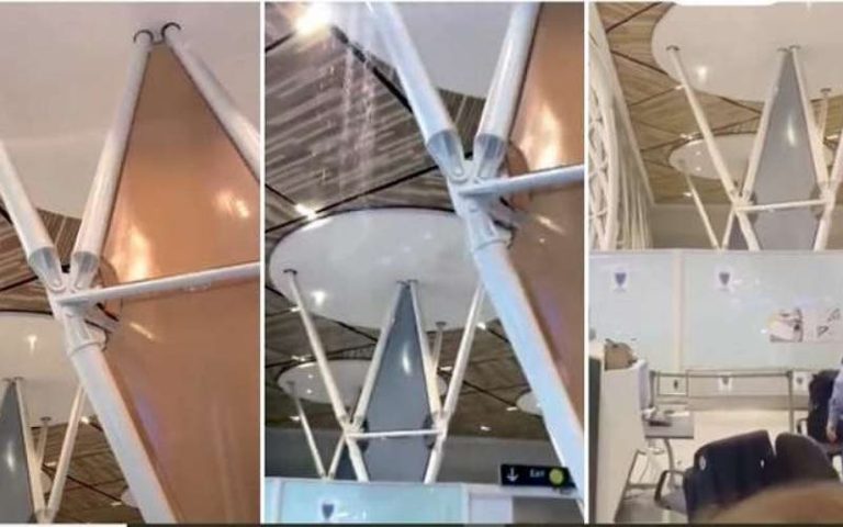 Rain leaks from the roof of Marrakech airport reach the dome of the Parliament