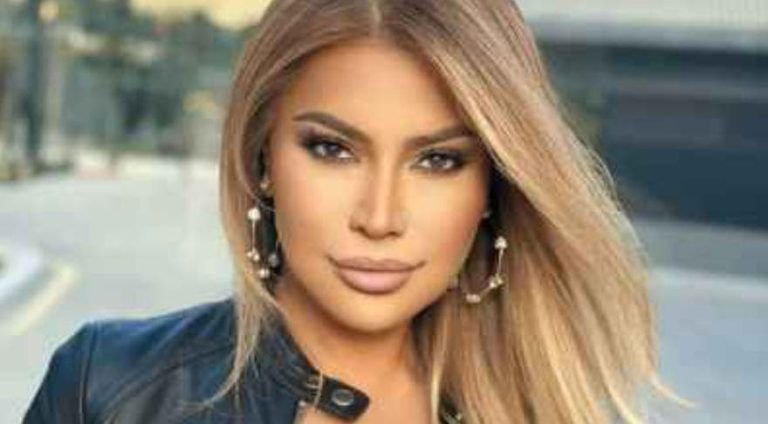 Nawal Al -Zoghbi falls on stage during the Eid Al -Fitr party in Beirut