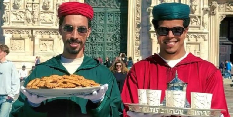 Saeed and Wadih distribute Moroccan tea and cakes in the streets of Italy