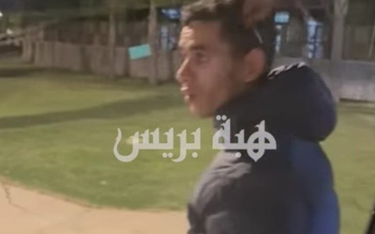 An armed gang faces a bus route carrying workers in Tangier