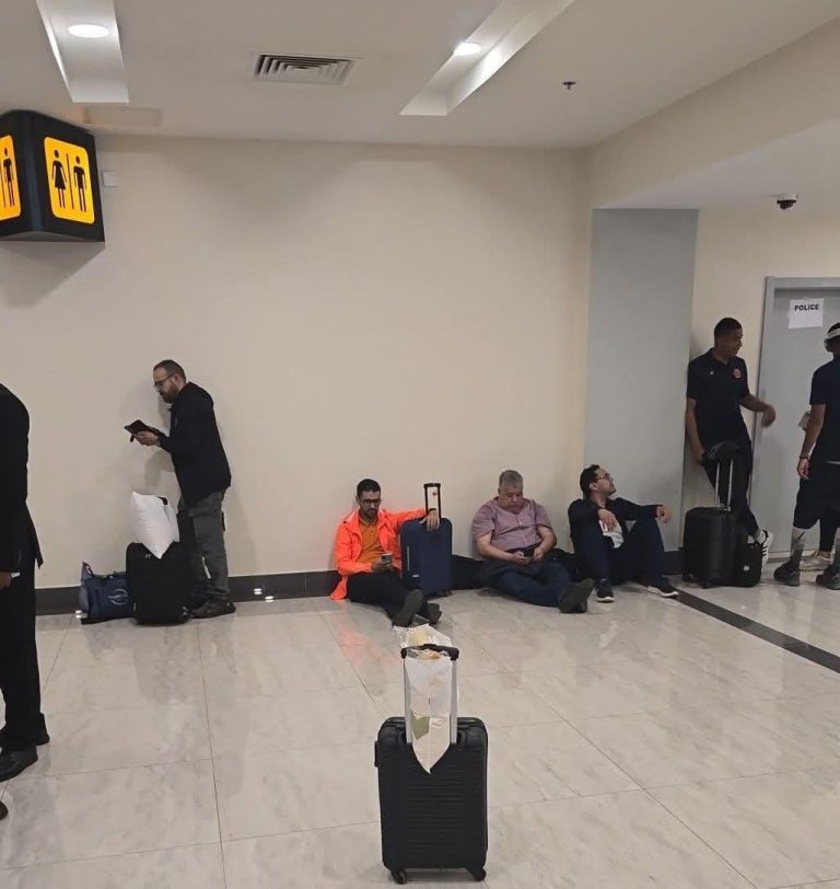 The rebirth mission of a volcano stuck at Zanzibar airport, in the middle of a bad case of Simba officials