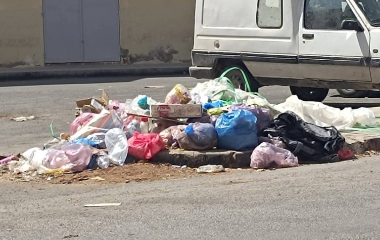 Oriental eyes .. the garbage is accumulated and the containers are absent