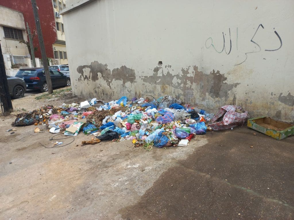 The accumulation of waste pollutes near the examination center for the Academy of Education in Fez